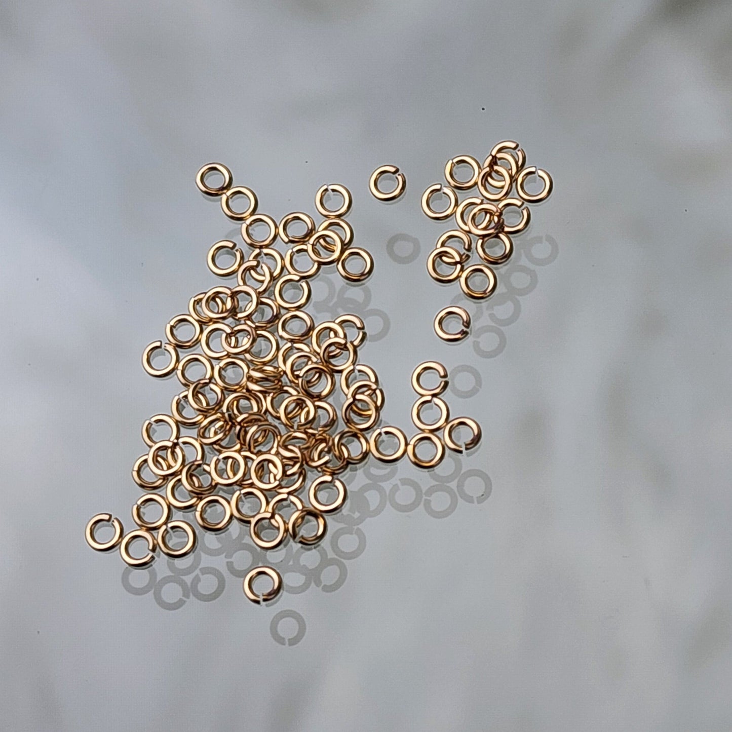 2.3 mm 24 gauge Jumprings Gold filled and Sterling silver Pack of 50